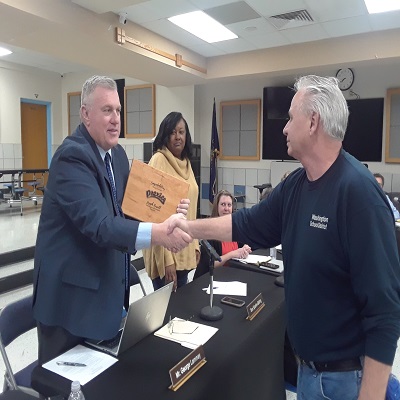  Joe Russell shaking George Lammay's hand